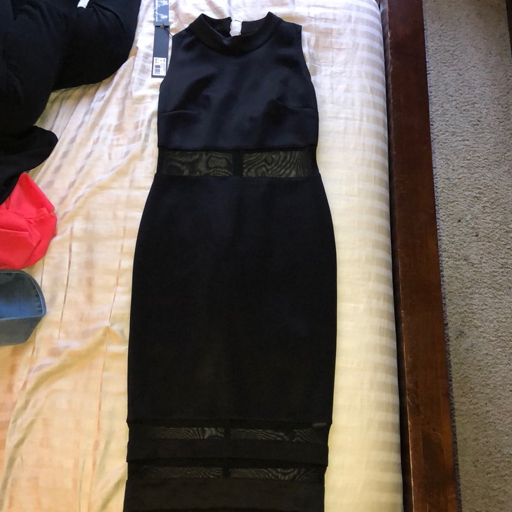 Little black dress with sheer panels